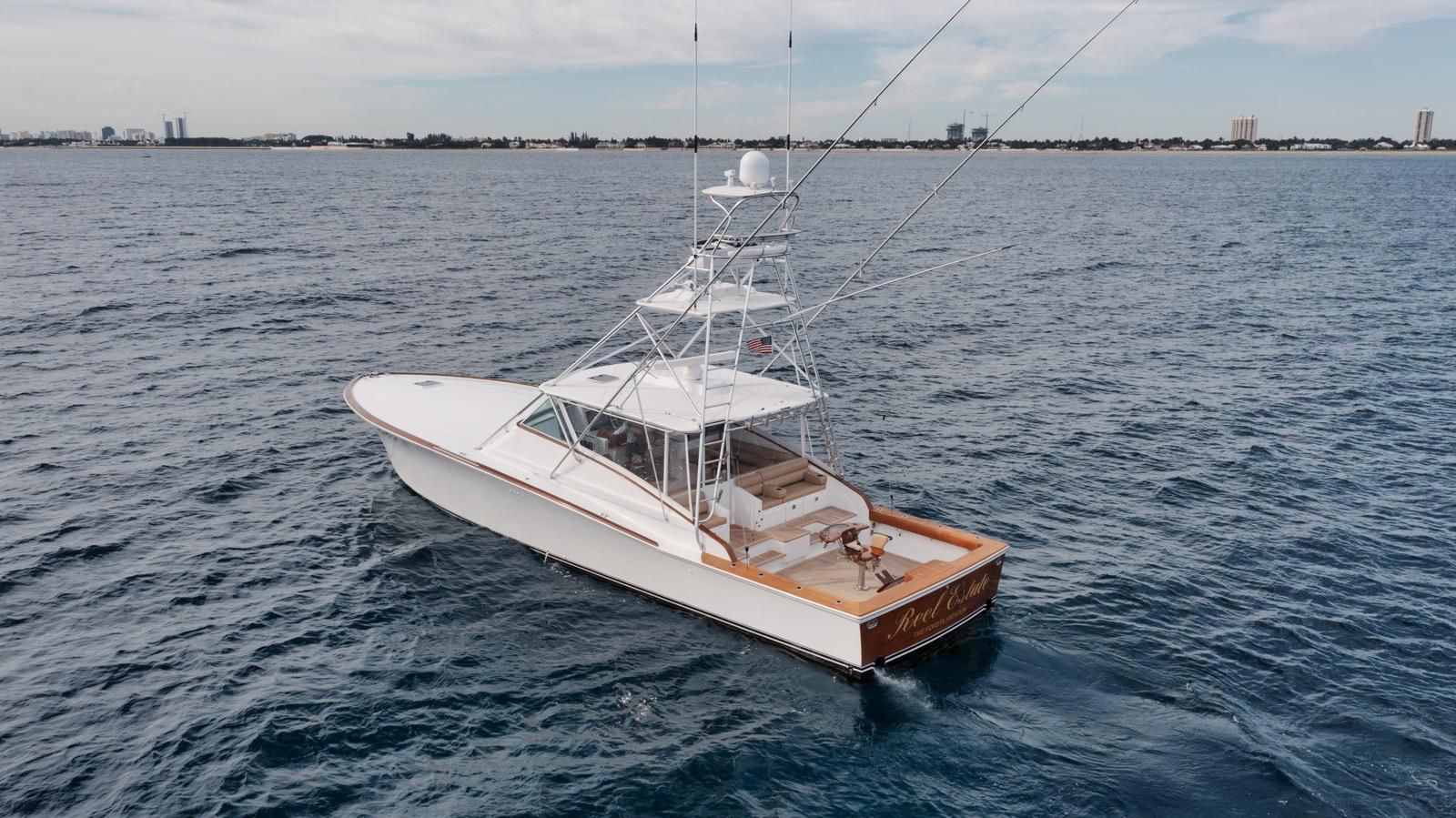 Big Fish, a sportfishing yacht with a tuna tower and outriggers